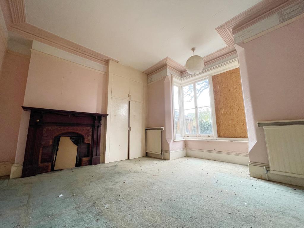 Lot: 96 - A SUBSTANTIAL ATTACHED PROPERTY WITH POTENTIAL - Ground floor room with fireplace and bay window